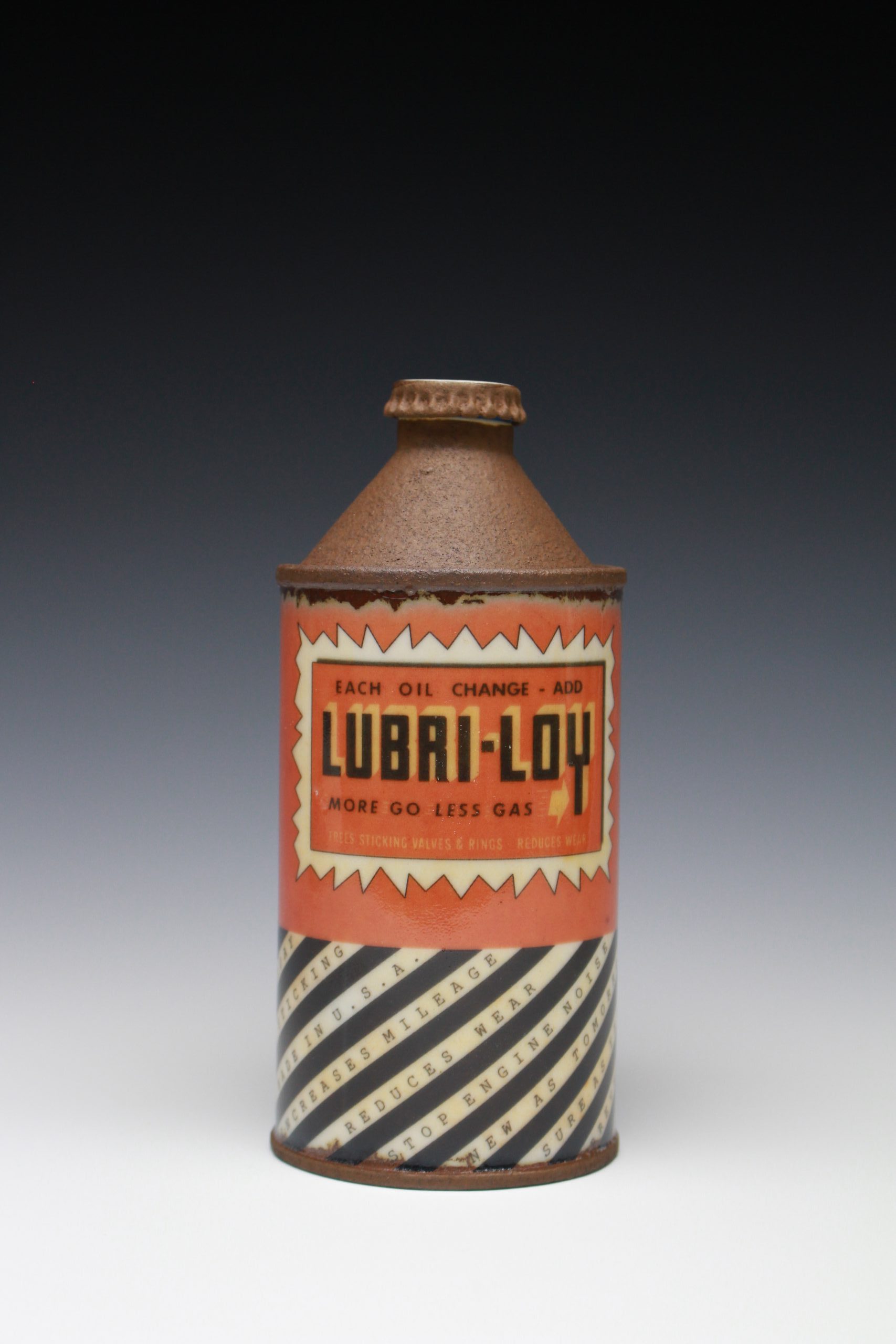Mitchell Spain, Lubri-Loy Cone-Top Bottle, 2017, porcelain and silicone, 6.25x2.875x2.875 inches, collection of the artist