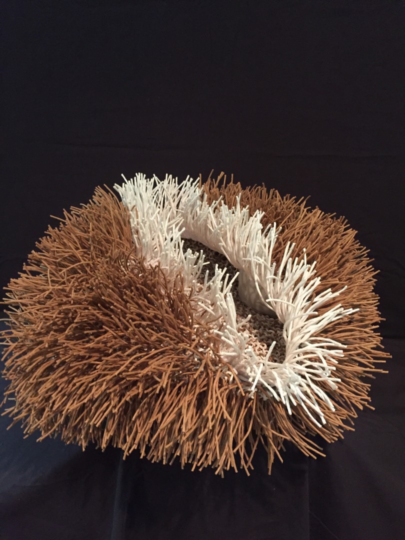 Elizabeth Read, Nesting I, 2019, Paper cord and zippers, 10x27x22 in., Collection of the artist