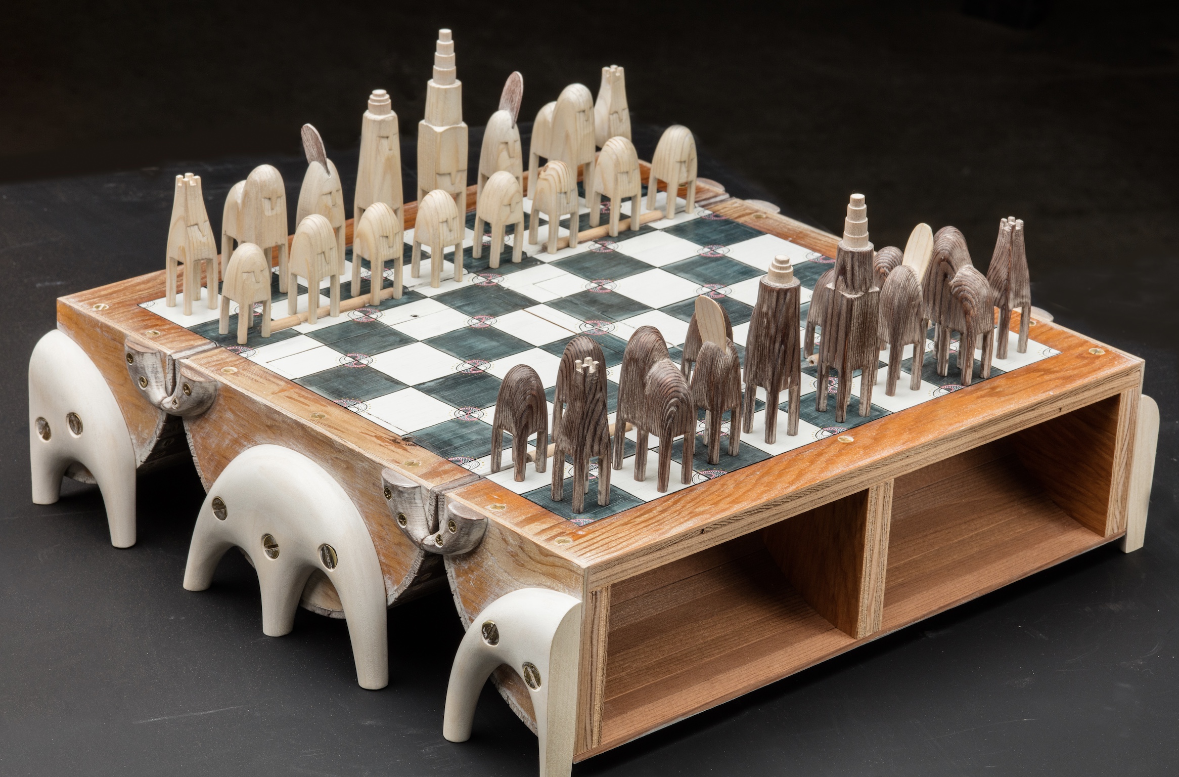 Chess Box and Set, 2021,
Salvaged wood/plywood,
hardware, polychrome
woodworking, 17x8x8 in.
when closed, 17x17x6 in.
when open, Courtesy of
the artist
