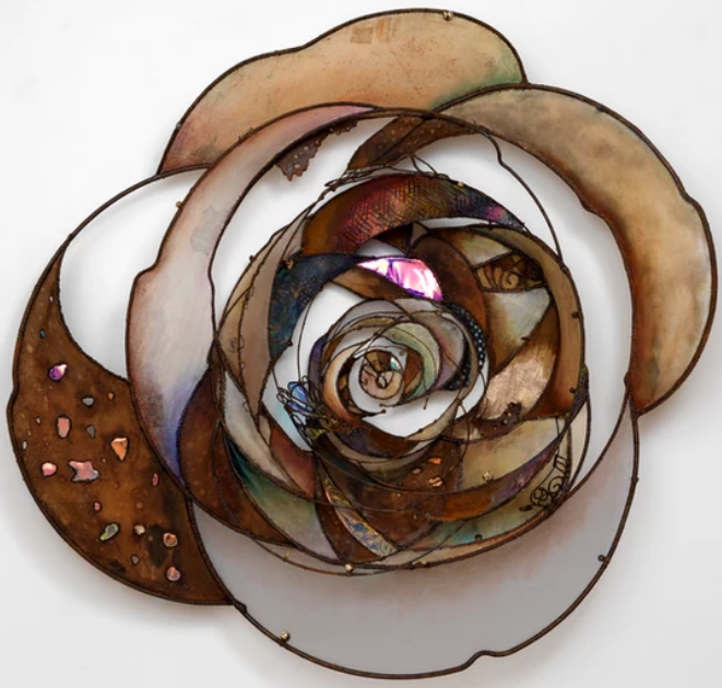 Cosmic Rose, 2020, Wall
sculpture, welded steel,
patina, sewn stained
muslin, mixed fabrics
coated with acrylic medium
51x52x11.5in., Courtesy of
the artist