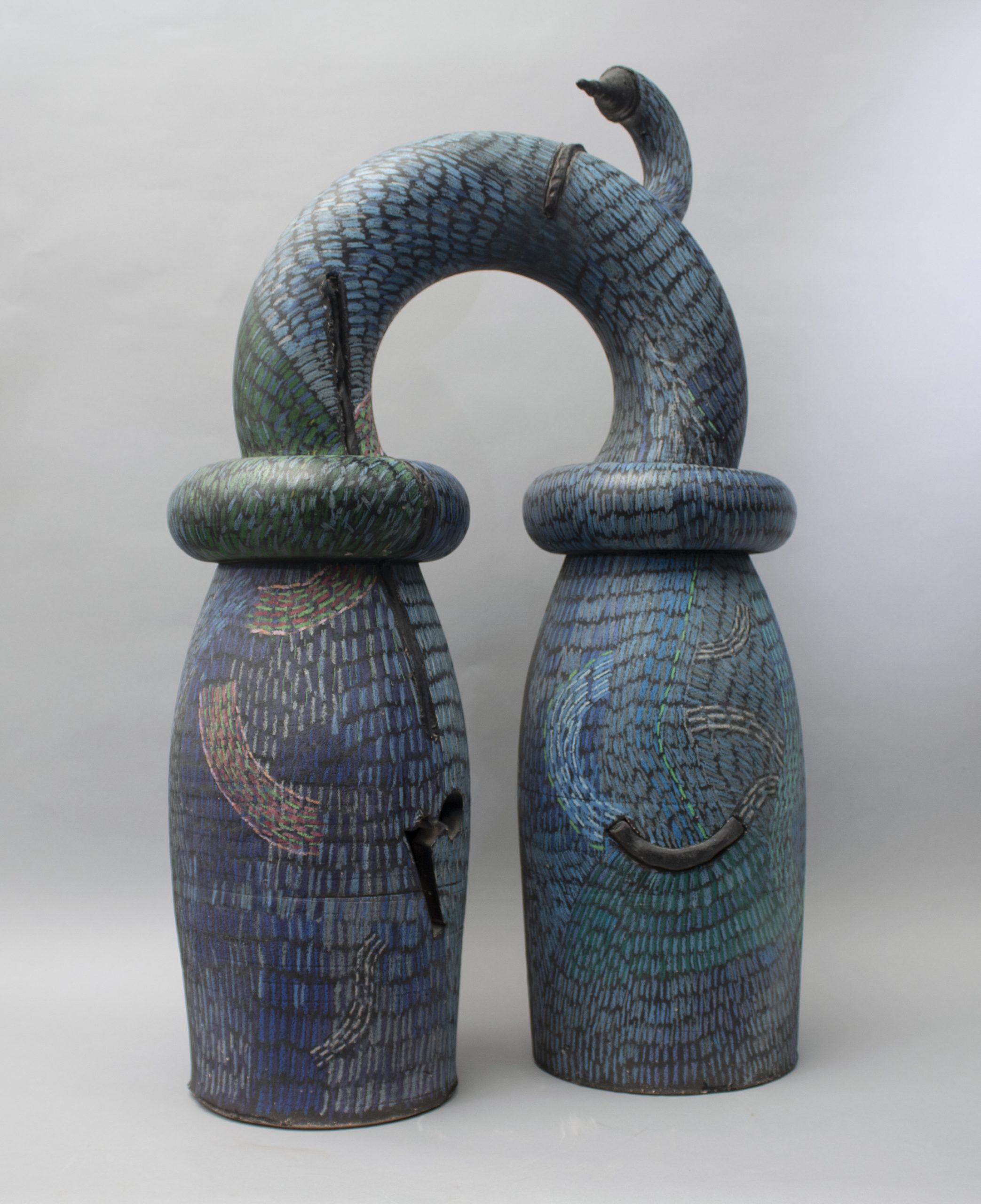 Bill Farrell, He Says, He Says, 1981, Enamel paint and cre pas on stoneware, 31 x 18 x 10 inches, Dubuque Museum of Art, Gift of the artist