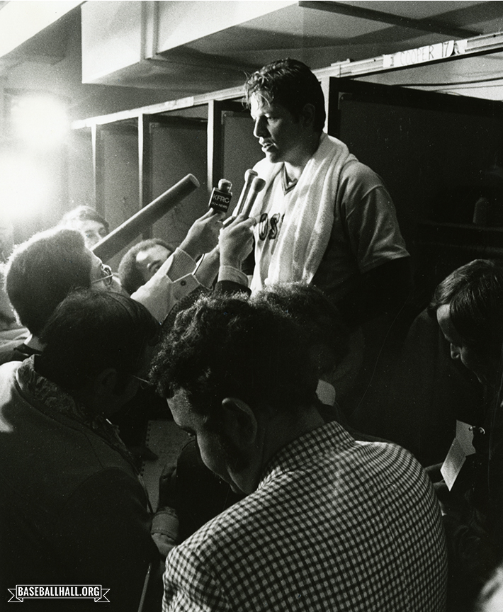 "Carlton Fisk with the media" by Doug McWilliams, October 7, 1975 Courtesy of the National Baseball Hall of Fame and Museum